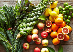 a group of fruits and vegetables on a wood surface Healthy Weight Loss Diets Hounslow